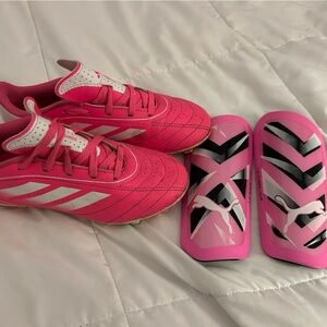 Girls adidas Goletto IX firm soccer cleats and puma shin guard (youth large)